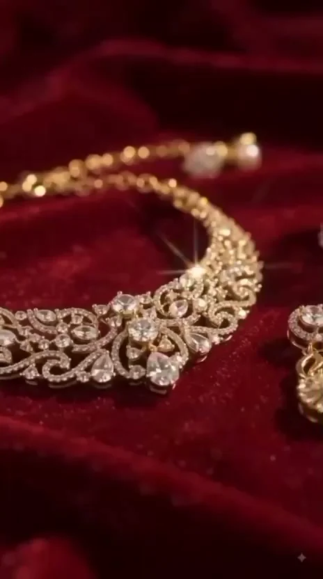Bridal diamond necklace set resting on deep red velvet